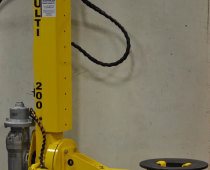 Manipulator Arm Lifts Tire Bladder Rings