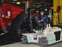 Mobulator installing track during assembly.